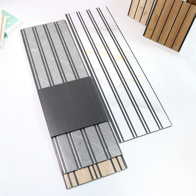 Panneau mural en bois de grain de PVC Panneau mural décoratif Matériau respectueux de l'environnement Pour la chambre à coucher Salle de séjour TV Mural de fond