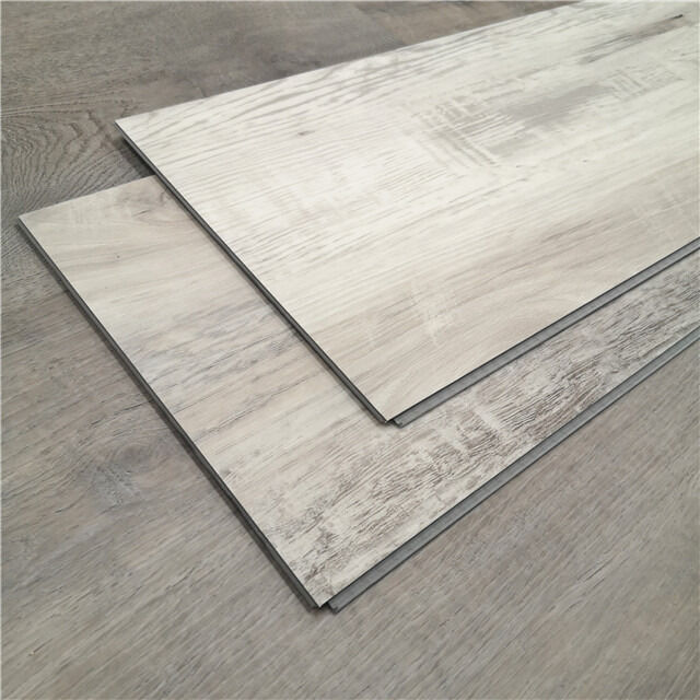 Formaldéhyde E0 SPC Résistance à la couture des revêtements de sol ≥ 1,5KN/M PVC avec matière première calcaire offre des performances dans les zones sujettes à l'humidité