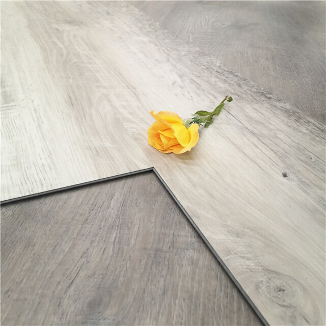 5 mm 6,5 mm ou épaisseur personnalisée Plancher en pierre polymère imperméable à l'eau Matériau de plancher résistant à l'usure Conçu pour l'industrie commerciale