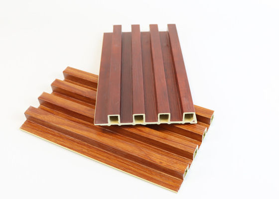 Revêtement en plastique en bois de mur de cavité de luxe de panneau de mur de WPC pour la décoration à la maison
