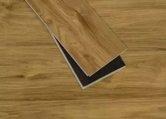 Planche en bois SPC de vinyle de texture parquetant le clic artificiel de noyau en plastique en pierre de 1220x180mm