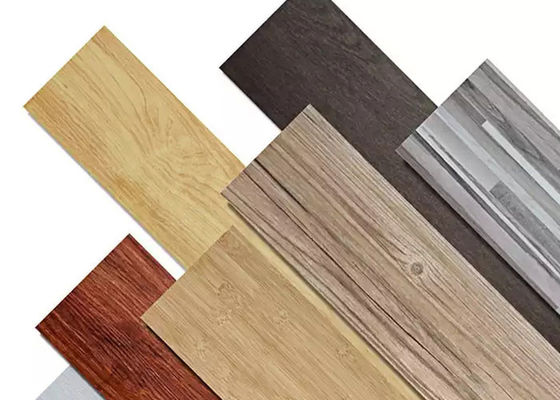 Planche en bois SPC de vinyle de texture parquetant le clic artificiel de noyau en plastique en pierre de 1220x180mm