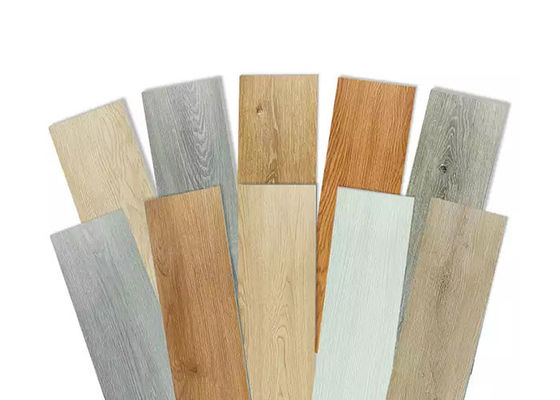 Planche en bois SPC de vinyle de texture parquetant le clic artificiel de noyau en plastique en pierre de 1220x180mm