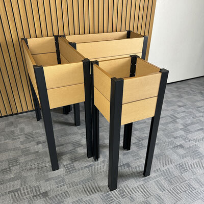 Lit de jardin surélevé avec des jambes métalliques pour la plantation d'herbes végétales en plein air